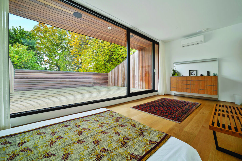 full-wall lift and slide door by Chateau Window & Door Systems.